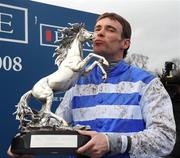 13 January 2008; Jockey Timmy Murphy celebrates with the Pierse Hurdle trophy. Pierse Hurdle, Leopardstown Racecourse, Leopardstown, Dublin. Picture credit; Caroline Quinn / SPORTSFILE