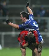 21 January 2008; Cavan's John McCutcheon turns to celebrate after scoring his side's second goal as Down's Kevin McGuigan holds his head in despair. McKenna Cup semi-final, Down v Cavan, Paric Esler, Newry, Co. Down. Picture credit; Oliver McVeigh / SPORTSFILE