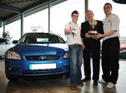 21 January 2008; Pictured are PFAI/Ford Premier Division Player of the Year, Brian Shelley, right, and PFAI/Ford First Division Player of the Year, Conor Gethins receiving their brand new Ford Focus cars from Ford’s Regional Manager Martin Canniffe. Shelley, Drogheda United and Gethins, Finn Harps, both have the use of the Ford Focus cars for the year after winning their respective Ford/PFAI Awards in November. Airside Ford, Airside Motor Park, Nevinstown, Swords, Dublin. Picture credit: Brian Lawless / SPORTSFILE