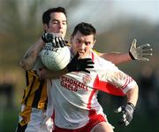 27 January 2008; Fergus McMahon, Tir Chonaill Gaels, in action against Aaron Kernan, Crossmaglen Rangers. AIB All-Ireland Club Football Championship Quarter-Final, Tir Chonaill Gaels v Crossmaglen Rangers, Emerald Gaelic Grounds, Ruislip, London, England. Picture credit: Oliver McVeigh / SPORTSFILE