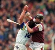 30 April 2000; Brian Feeney of Galway in action against Anthony Kirwan of Waterford during the Church & General National Hurling League Division 1 Semi-Final match between Galway and Waterford at Semple Stadium in Thurles, Tipperary. Photo by Ray McManus/Sportsfile