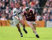30 April 2000; Joe Cooney of Galway in action against Dan Shanahan of Waterford during the Church & General National Hurling League Division 1 Semi-Final match between Galway and Waterford at Semple Stadium in Thurles, Tipperary. Photo by Damien Eagers/Sportsfile