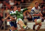 14 May 2000; Stephen Maguire of Fermanagh  shoots to score his side's first goal during the Bank of Ireland Ulster Senior Football Championship Preliminary Round match between Fermanagh and Monaghan at Brewster Park in Enniskillen, Fermanagh. Photo by Damien Eagers/Sportsfile