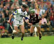 30 April 2000; Tom Feeney of Waterford in action against Fergal Healy of Galway during the Church & General National Hurling League Division 1 Semi-Final match between Galway and Waterford at Semple Stadium in Thurles, Tipperary. Photo by Damien Eagers/Sportsfile