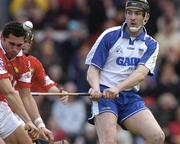 18 April 2004; Andy Moloney of Waterford in action against Seán Óg Ó hAilpín of Cork during the Allianz National Hurling League Group 1 Round 2 match between Cork and Waterford at Páirc Uí Rinn in Cork. Photo by David Maher/Sportsfile