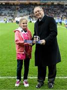 7 March 2015; Donal Bollard, from Allianz Ireland, makes a special presentation in Croke Park to Chloe Munnelly, from St Martin De Porres National School, Aylesbury, Tallaght, Co. Dublin, to mark her outstanding performance during the Allianz Cumann na mBunscol competitions. Croke Park, Dublin. Picture credit: Brendan Moran / SPORTSFILE