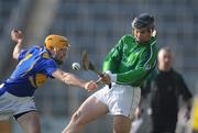 17 February 2008; Hugh Flavin, Limerick, in action against James Woodlock, Tipperary. Allianz National Hurling League, Division 1B, Round 2, Tipperary v Limerick, Semple Stadium, Thurles, Co. Tipperary. Picture credit; Brendan Moran / SPORTSFILE