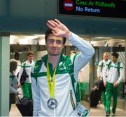 9 March 2015; Ireland's Mark English pictured on the team's arrival at Dublin Airport after he won a silver medal in the Men's 800m at the European Indoors Athletics Championships in Prague. Dublin Airport, Dublin. Picture credit: David Maher / SPORTSFILE