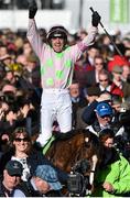 10 March 2015; Ruby Walsh celebrates as he's led into the parade ring after winning the Champion Hurdle on Faugheen. Cheltenham Racing Festival 2015, Prestbury Park, Cheltenham, England. Picture credit: Ramsey Cardy / SPORTSFILE