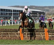 10 March 2015; Faugheen, with Ruby Walsh up, jumps the last on the way to winning the Champion Hurdle. Cheltenham Racing Festival 2015, Prestbury Park, Cheltenham, England. Picture credit: Ramsey Cardy / SPORTSFILE