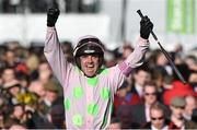 10 March 2015; Ruby Walsh celebrates as he's led into the winner's enclosure after ?victory in the Champion Hurdle on Faugheen. Cheltenham Racing Festival 2015, Prestbury Park, Cheltenham, England. Picture credit: Ramsey Cardy / SPORTSFILE