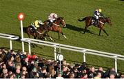 10 March 2015; Glens Melody, left, with Paul Townend up, on their way to winning the David Nicholson Mares' Hurdle from Polly Peachum, 12, with Barry Geraghty up, who finished second, and Bitofapuzzle, 2, with Noel Fehily up, who finished third. Cheltenham Racing Festival 2015, Prestbury Park, Cheltenham, England. Picture credit: Matt Browne / SPORTSFILE