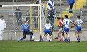 2 March 2008; Armagh's Aidan O'Rourke, centre, shoots the ball past Monaghan goalkeeper Padraig McBennett to score a last minute goal. Allianz National Football League, Division 2, Round 3, Monaghan v Armagh, St Tighearnach's Park, Clones, Co. Monaghan. Picture credit: Oliver McVeigh / SPORTSFILE