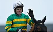 13 March 2015; Jockey Tony McCoy waves to the crowd after the Grand Annual Chase. Cheltenham Racing Festival 2015, Prestbury Park, Cheltenham, England. Picture credit: Ramsey Cardy / SPORTSFILE