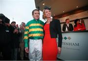 13 March 2015; Jockey Tony McCoy and his wife Chanelle after his last race at Cheltenham. Cheltenham Racing Festival 2015, Prestbury Park, Cheltenham, England. Picture credit: Matt Browne / SPORTSFILE