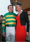 13 March 2015; Jockey Tony McCoy and his wife Chanelle after his last race at Cheltenham. Cheltenham Racing Festival 2015, Prestbury Park, Cheltenham, England. Picture credit: Matt Browne / SPORTSFILE