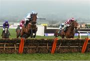 13 March 2015; Killultagh Vic, with Luke Dempsey up, leads Noble Endeavour, with Kevin Sexton up, who finished second, on their way to winning the Conditional Jockeys Hurdle. Cheltenham Racing Festival 2015, Prestbury Park, Cheltenham, England. Picture credit: Ramsey Cardy / SPORTSFILE