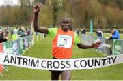 14 March 2015; Thomas Ayeko from Uganda, crosses the line to win the Senior Men's race at the IAAF Antrim International Cross Country. Greenmount College, Co. Antrim. Picture credit: Oliver McVeigh / SPORTSFILE