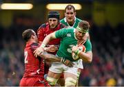 14 March 2015; Jamie Heaslip, Ireland, is tackled by Jamie Roberts, left, and Luke Charteris, Wales. RBS Six Nations Rugby Championship, Wales v Ireland. Millennium Stadium, Cardiff, Wales. Picture credit: Stephen McCarthy / SPORTSFILE