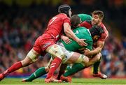 14 March 2015; Sean O'Brien, Ireland, is tackled by Sam Warburton, left, and Rhys Webb, Wales. RBS Six Nations Rugby Championship, Wales v Ireland, Millennium Stadium, Cardiff, Wales. Picture credit: Brendan Moran / SPORTSFILE