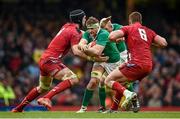 14 March 2015; Jamie Heaslip, Ireland, is tackled by Luke Charteris, Wales. RBS Six Nations Rugby Championship, Wales v Ireland, Millennium Stadium, Cardiff, Wales. Picture credit: Brendan Moran / SPORTSFILE