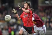 15 March 2015; Conor Laverty, Down, in action against Mark McCallon, Westmeath. Allianz Football League, Division 2, Round 5, Westmeath v Down, Cusack Park, Mullingar, Co. Westmeath. Picture credit: Matt Browne / SPORTSFILE