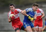 15 March 2015; Carlus McWilliams, Derry, is tackled by Fintan Kelly, Monaghan. Allianz Football League, Division 1, Round 5, Monaghan v Derry, St Tiernach’s Park, Clones, Co. Monaghan. Picture credit: Ramsey Cardy / SPORTSFILE