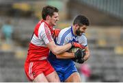 15 March 2015; Neil McAdam, Monaghan, is tackled by Brian Óg McGilligan, Derry. Allianz Football League, Division 1, Round 5, Monaghan v Derry, St Tiernach’s Park, Clones, Co. Monaghan. Picture credit: Ramsey Cardy / SPORTSFILE