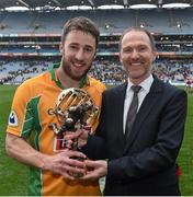 17 March 2015; Corofin's Michael Farragher who was presented with the Man of the Match award by Brian Keating, AIB Brand Director. AIB GAA Football All-Ireland Senior Club Championship Final, Corofin v Slaughtneil, Croke Park, Dublin. Picture credit: Ray McManus / SPORTSFILE