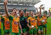 17 March 2015; Michael Farragher, with trophy, Corofin, and teammates including Martin Farragher, left, celebrate. AIB GAA Football All-Ireland Senior Club Championship Final, Corofin v Slaughtneil, Croke Park, Dublin. Picture credit: Cody Glenn / SPORTSFILE