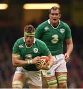 14 March 2015; Jamie Heaslip with the support of his Ireland team-mate Devin Toner. RBS Six Nations Rugby Championship, Wales v Ireland. Millennium Stadium, Cardiff, Wales. Picture credit: Stephen McCarthy / SPORTSFILE