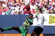 11 June 2000; Niall Quinn of Republic of Ireland in action against Aaron Mokoena of South Africa during the US Nike Cup match between Republic of Ireland and South Africa at Giants Stadium in East Rutherford, New Jersey, USA. Photo by David Maher/Sportsfile