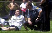 9 June 2000;  Robbie Keane in conversation with Sergeant Jim Collins, from the Stevens Police Department, Hoboken in New Jersey, who is orginally from Crumlin, Dublin, during a Republic of Ireland training session at Stevens Insitute in Hoboken, New Jersey, USA. Photo by David Maher/Sportsfile