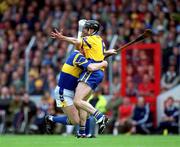 11 June 2000; Declan Ryan of Tipperary in action against Sean McMahon of Clare during the Guinness Munster Senior Hurling Championship Semi-Final match between Tipperary and Clare at Páirc Uí Chaoimh in Cork. Photo by Ray McManus/Sportsfile