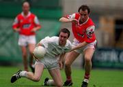 11 June 2000; Tadgh Fennin of Kildare in action against Brien Phillips of Louth during the Bank of Ireland Leinster Senior Football Championship Quarter-Final match between Kildare and Louth at Croke Park in Dublin. Photo by Brendan Moran/Sportsfile