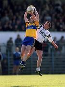 9 April 2000; Neil Hawes of Clare in action against Paul Taylor of Sligo during the Church & General National Football League Division 1B match between Clare and Sligo at Cusack Park in Ennis, Clare. Photo by Damien Eagers/Sportsfile