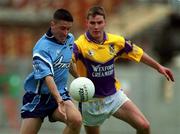 11 June 2000; Senan Connell of Dublin in action against Pat Forde of Wexford during the Bank of Ireland Leinster Senior Football Championship Quarter-Final match between Dublin and Wexford at Croke Park in Dublin. Photo by Brendan Moran/Sportsfile