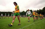 11 June 2000; Donegal captain Jim McGuinness leads his team in the pre-match parade ahead of the Bank of Ireland Ulster Senior Football Championship Quarter-Final match between Donegal and Fermanagh at MacCumhail Park in Ballybofey, Donegal. Photo by Ray Lohan/Sportsfile