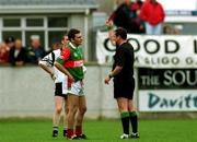 11 June 2000; Referee Aidan Mangan issues a red card to James Horan of Mayo during the Bank of Ireland Connacht Senior Football Championship Quarter-Final match between Sligo and Mayo at Markievicz Park in Sligo. Photo by Damien Eagers/Sportsfile