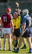 22 March 2015; Joe Canning, 11, Galway, is shown the yellow card by referee Johnny Ryan. Allianz Hurling League Division 1A, round 5, Dublin v Galway. Parnell Park, Dublin. Picture credit: Piaras Ó Mídheach / SPORTSFILE