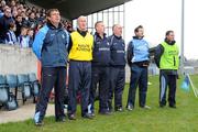 23 March 2008; Dublin manager Paul Caffrey, third from left, stands for  Amhrán na bhFiann with officials, from left, David Whelan, Paul Clarke, selector, Gerry McElvaney, Team Doctor, John Murphy, Chartered Physiotherapist, and Pat Burke. Allianz National Hurling League, Division 2, Round 4, Dublin v Monaghan, Parnell Park, Dublin. Picture credit; Stephen McCarthy / SPORTSFILE