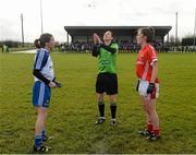 22 February 2015; Referee Maggie Farrelly performs the coin toss in the company of team captains Sharon Courtney, left, Monaghan, and Ciara O'Sullivan, Cork. TESCO HomeGrown Ladies National Football League, Division 1, Round 3, Monaghan v Cork,  Blackhill Emeralds GAC, Castleblayney, Co. Monaghan. Picture credit: Brendan Moran / SPORTSFILE