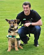 2 April 2008; Sunderland manager, Roy Keane, with Izac, a 4 month old German Shepard in training, at the launch of the Sixth Irish Guide Dogs for the Blind / Specsavers SHADES 2008 Campaign. Shades National Fundraising & awareness campaign week runs 5th - 10th May. The Radisson SAS, St Helens Hotel, Stillorgan, Dublin. Picture credit: Brian Lawless / SPORTSFILE