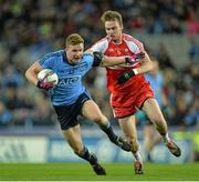 28 March 2015; Ciarán Kilkenny, Dublin, in action against Liam McGoldrick, Derry. Allianz Football League, Division 1, Round 6, Dublin v Derry. Croke Park, Dublin. Picture credit: Brendan Moran / SPORTSFILE