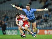 28 March 2015; Benny Heron, Derry, in action against Paul Flynn, Dublin. Allianz Football League, Division 1, Round 6, Dublin v Derry. Croke Park, Dublin. Picture credit: Ray McManus / SPORTSFILE