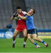 28 March 2015; Daniel Heavron, Derry, in action against Paul Flynn, Dublin. Allianz Football League, Division 1, Round 6, Dublin v Derry. Croke Park, Dublin. Picture credit: Ray McManus / SPORTSFILE