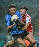 28 March 2015; Cormac Costello, Dublin, in action against Oisin Duffy, Derry. Allianz Football League, Division 1, Round 6, Dublin v Derry. Croke Park, Dublin. Picture credit: Ray McManus / SPORTSFILE