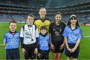 28 March 2015; Match referee Conor Lane with mascot Daniel Sheridan, Scoil Mhuire, Howth; young referee Fionn Halligan, St Pius NS, Tempelogue; mascot Sean McCabe, Gael Scoil Míde, Kilbarrack; young referee Jasmin Kamtoh, Holy Trinity, NS; and mascot Clodagh McCahey, Gael Scoil Chnoc Lamhna, Knocklyon, before the game. Allianz Football League, Division 1, Round 6, Dublin v Derry. Croke Park, Dublin. Picture credit: Ray McManus / SPORTSFILE