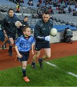 28 March 2015; Dublin's Philip Mcmahon and mascot Daniel sheridan, Scoil Mhuire, Howth, run out before the game. Allianz Football League, Division 1, Round 6, Dublin v Derry. Croke Park, Dublin. Picture credit: Ray McManus / SPORTSFILE