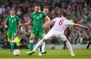 29 March 2015; Jon Walters, Republic of Ireland, in action against Tomasz Jodlowiec, Poland. UEFA EURO 2016 Championship Qualifier, Group D, Republic of Ireland v Poland. Aviva Stadium, Lansdowne Road, Dublin. Picture credit: Pat Murphy / SPORTSFILE